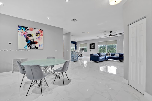 dining room with ceiling fan