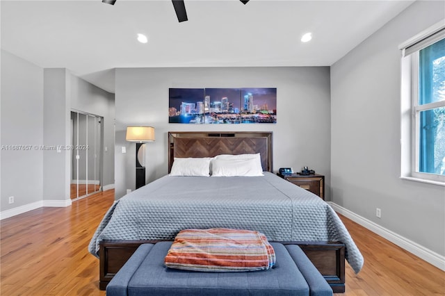 bedroom featuring ceiling fan and hardwood / wood-style floors