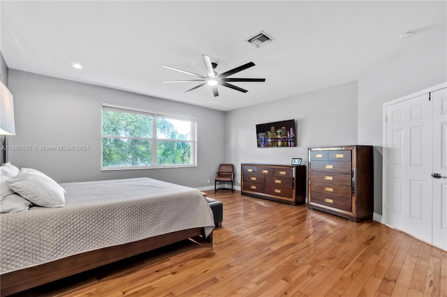 bedroom featuring hardwood / wood-style flooring and ceiling fan