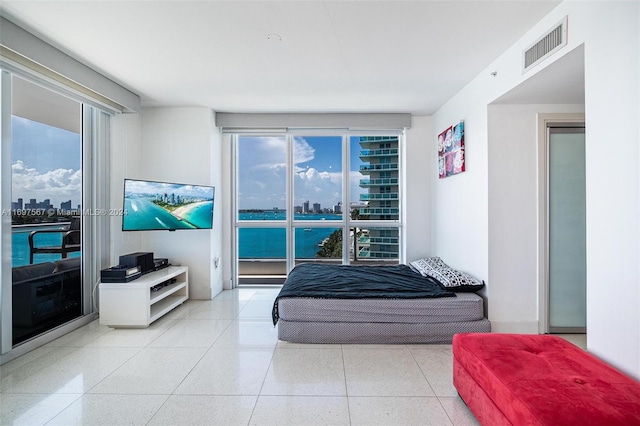 bedroom featuring multiple windows