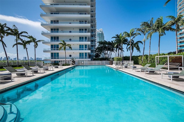 view of pool featuring a patio