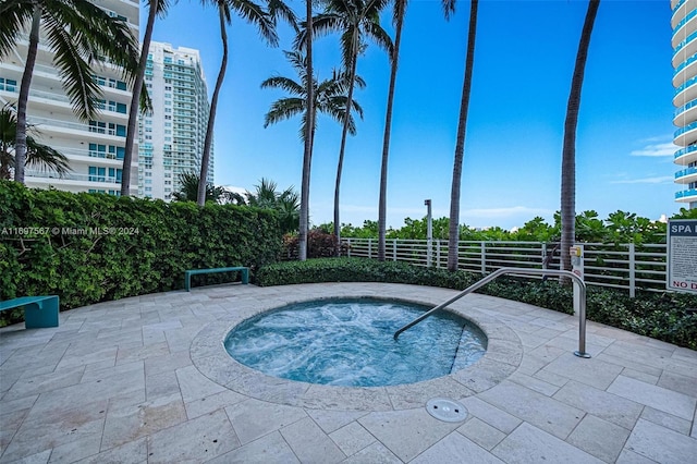 view of pool featuring a community hot tub