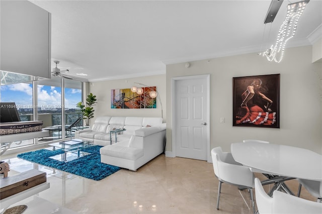 living room featuring ceiling fan with notable chandelier, expansive windows, and crown molding