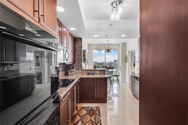 kitchen featuring tasteful backsplash, decorative light fixtures, light stone counters, stainless steel appliances, and a chandelier