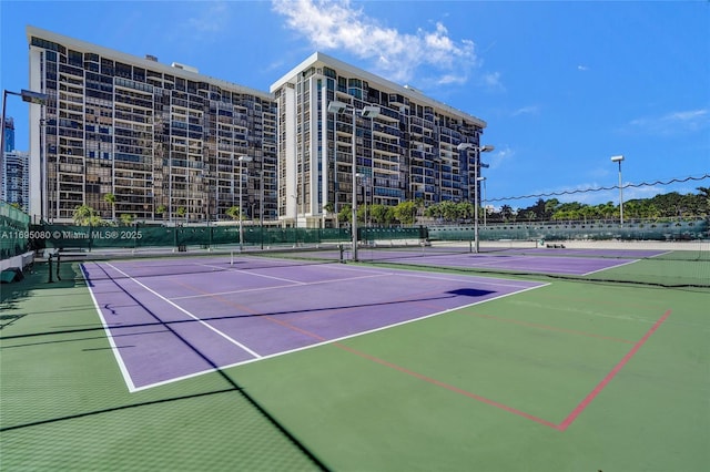 view of tennis court with basketball court