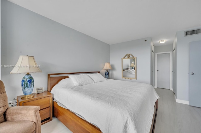 bedroom featuring light hardwood / wood-style flooring