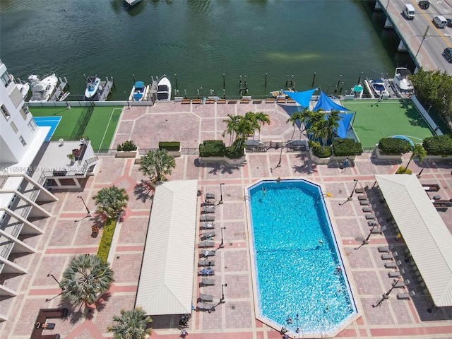 birds eye view of property featuring a water view