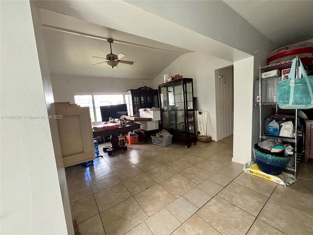 office with lofted ceiling, tile patterned floors, and ceiling fan