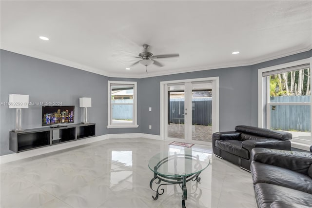 living room with ceiling fan, french doors, crown molding, and plenty of natural light