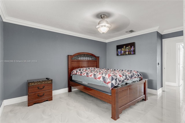 bedroom featuring ceiling fan and ornamental molding