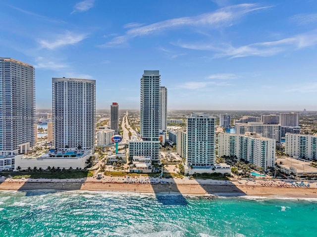 city view with a water view and a view of the beach