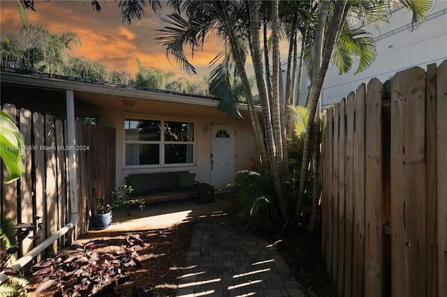 view of property exterior at dusk