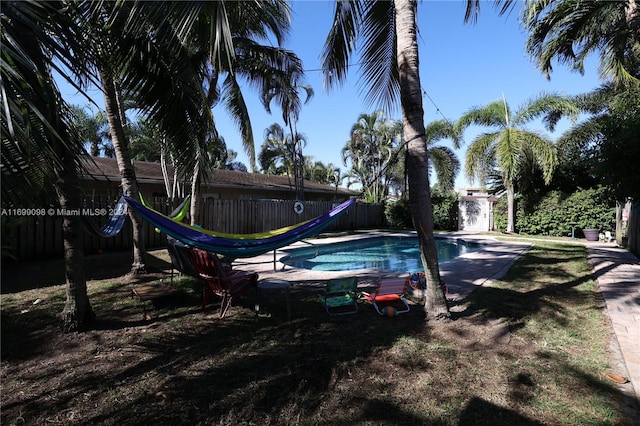 view of pool with a water slide