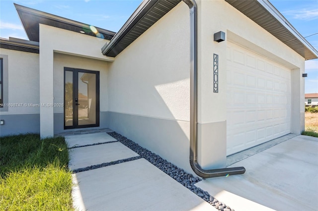 entrance to property featuring french doors