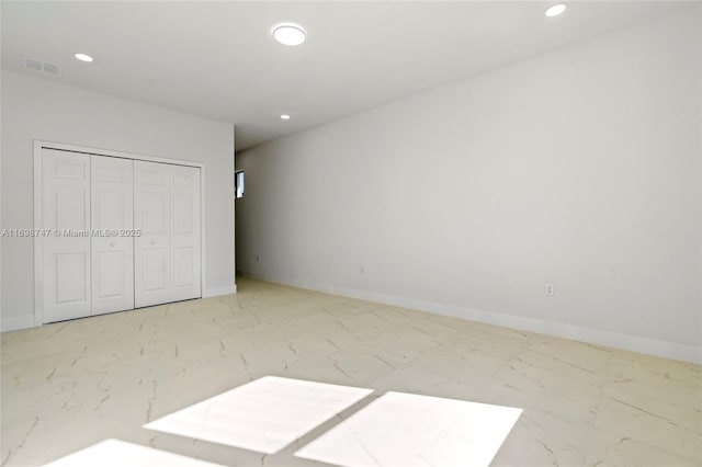 unfurnished bedroom featuring a closet