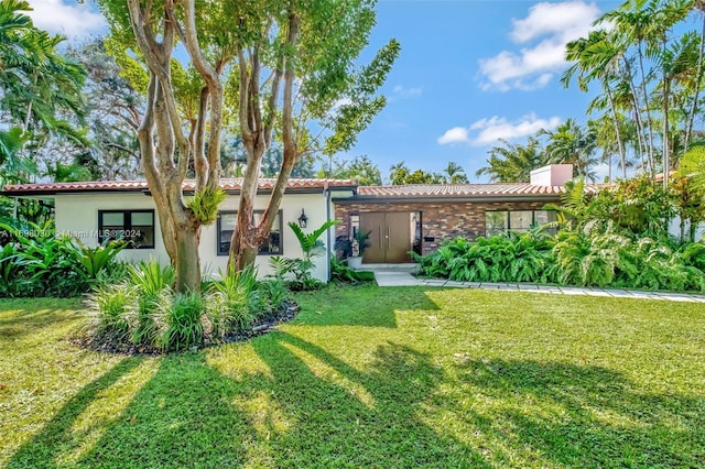 view of front of house with a front yard