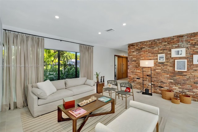 living room with brick wall