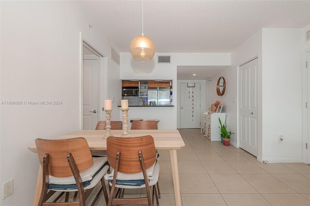 600 W Las Olas Blvd Unit 509S, Fort Lauderdale, FL 33312 - dining area featuring light tile patterned flooring