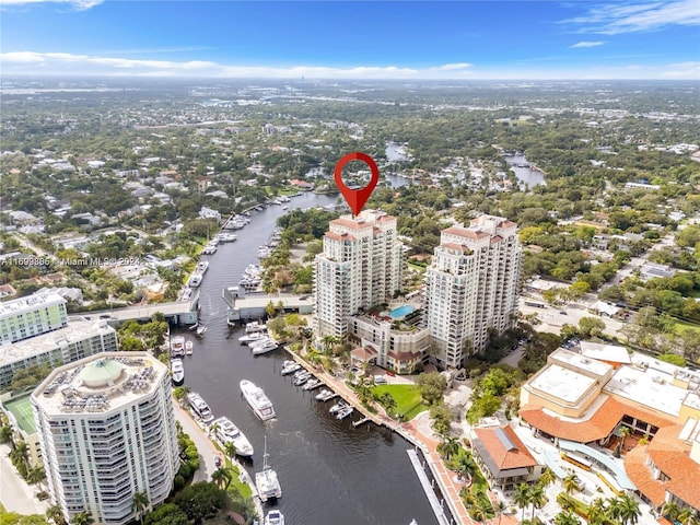 birds eye view of property featuring a water view