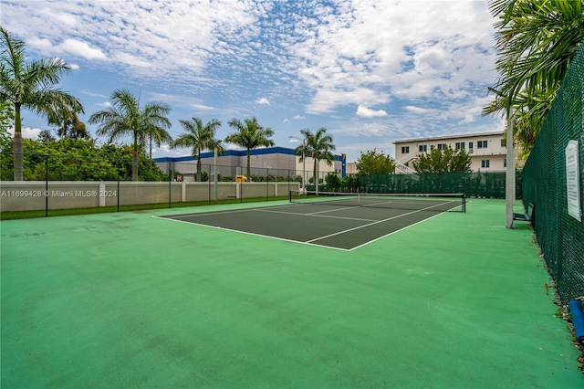 view of sport court featuring basketball hoop