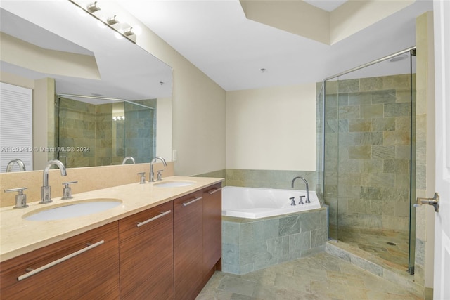 bathroom with plus walk in shower and vanity