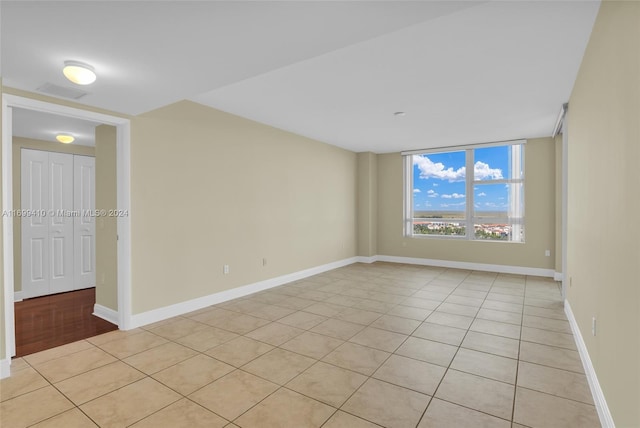 view of tiled spare room