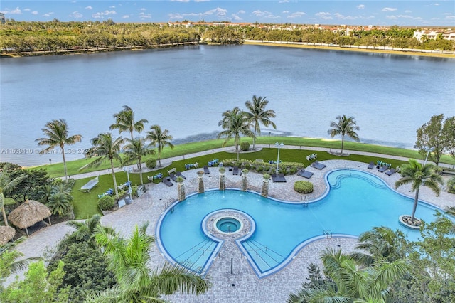 view of pool featuring a water view