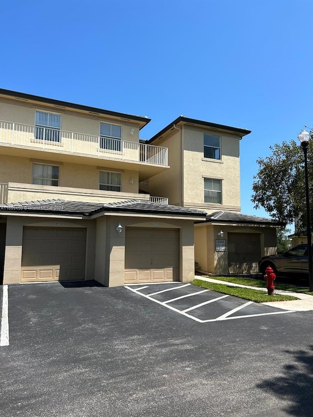 view of front of property with a garage