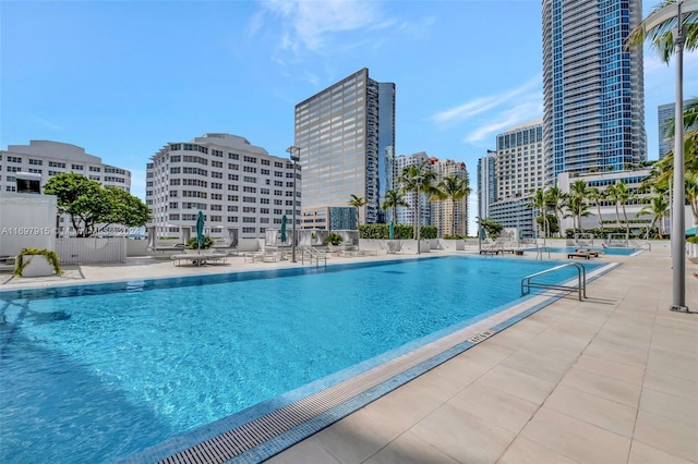 view of pool featuring a patio area