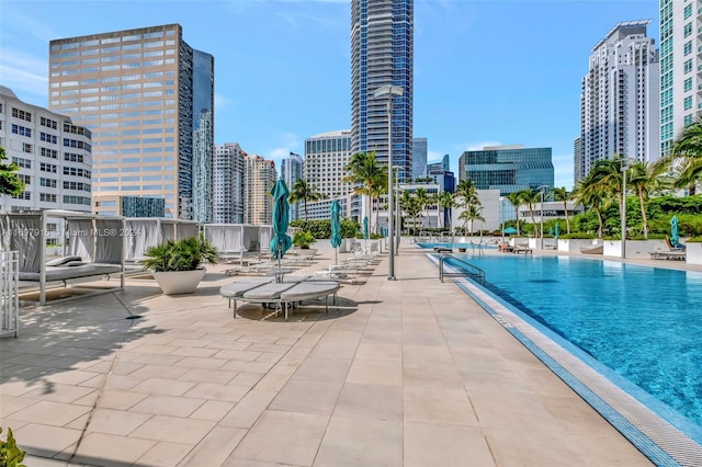 view of swimming pool with a patio area