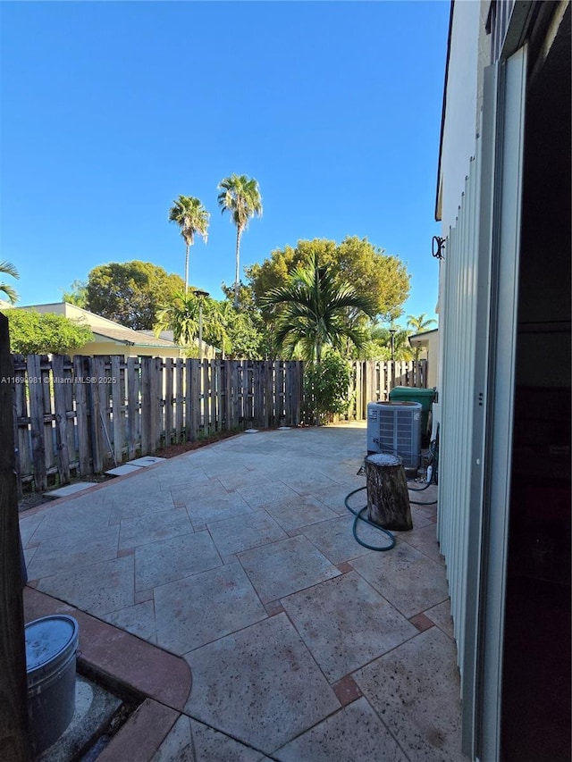 view of patio featuring central air condition unit