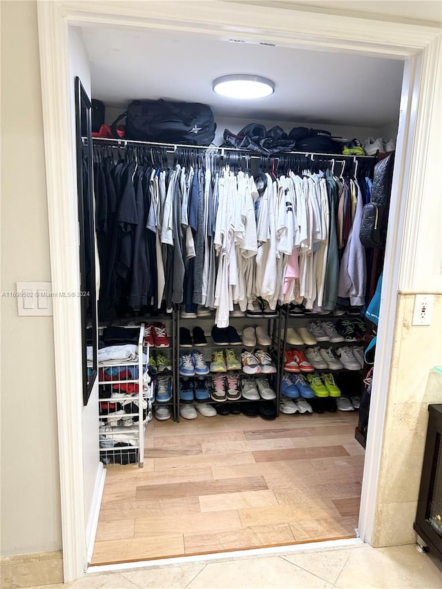 spacious closet featuring wood-type flooring