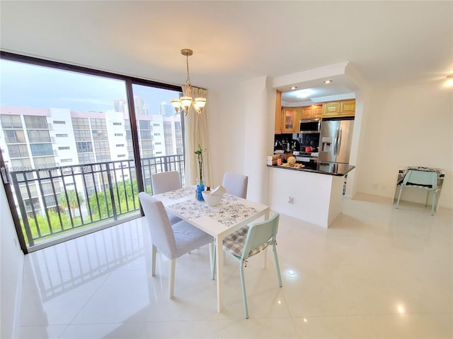 tiled dining area with a notable chandelier