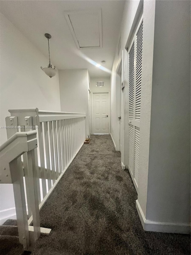 corridor featuring carpet flooring