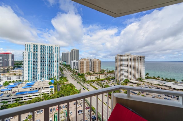 balcony featuring a water view