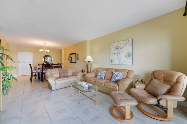 living room with light tile patterned floors and a notable chandelier