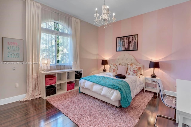 bedroom featuring a notable chandelier and dark hardwood / wood-style floors