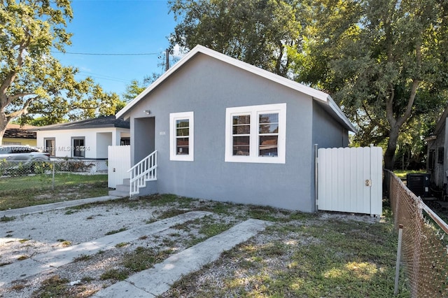 view of property exterior with cooling unit