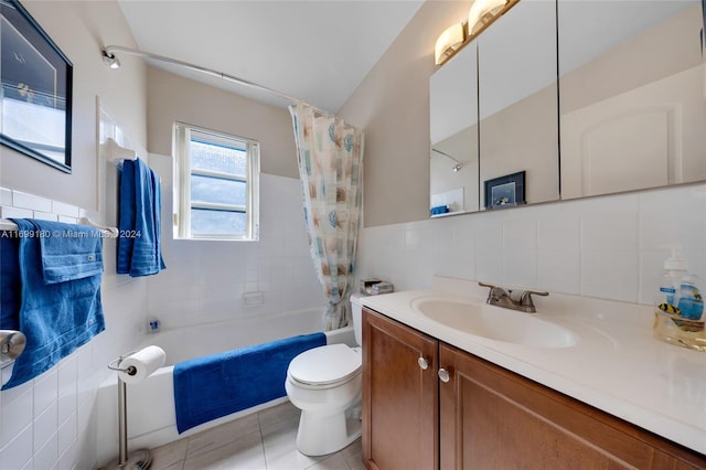 full bathroom with tile patterned floors, shower / bath combination with curtain, tile walls, and toilet