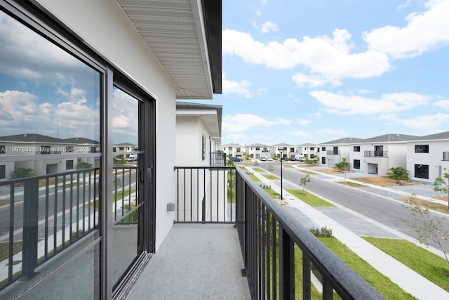 balcony featuring a residential view