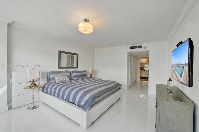 bedroom featuring light tile patterned floors and ornamental molding