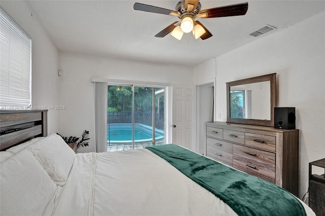 bedroom with access to outside and ceiling fan