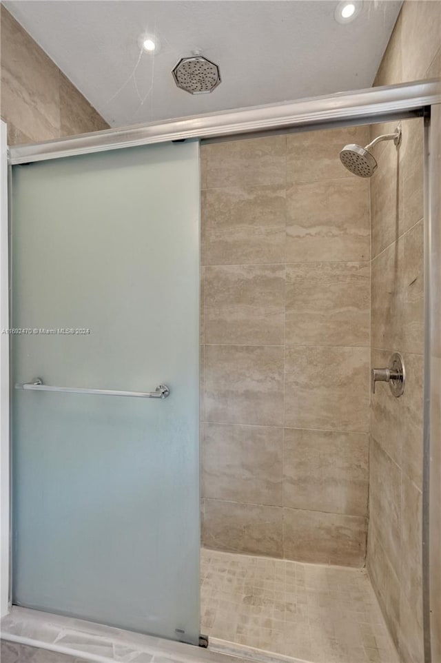 bathroom featuring walk in shower