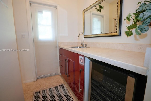 bathroom with beverage cooler and vanity