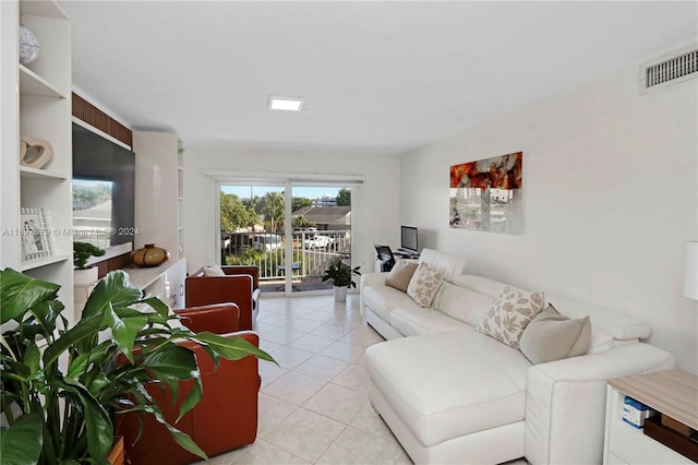 living room featuring light tile patterned floors