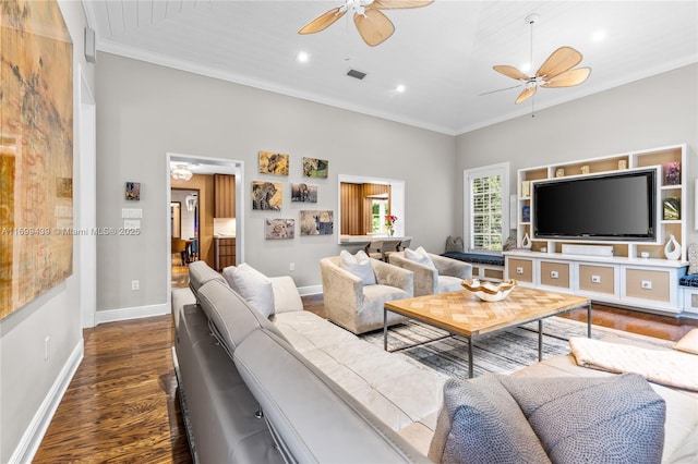 living room with ceiling fan, ornamental molding, and wood-type flooring