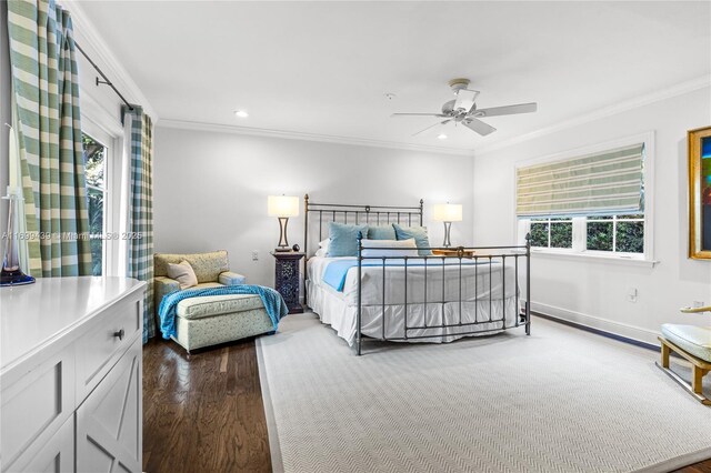 bedroom featuring crown molding, ceiling fan, and wood-type flooring