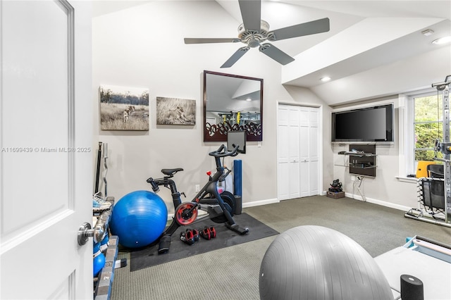 workout room featuring vaulted ceiling, carpet, and ceiling fan