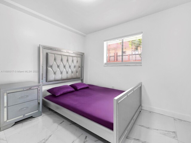 5390 W 21st Ct Unit 312, Hialeah, FL 33016 - bedroom featuring marble finish floors