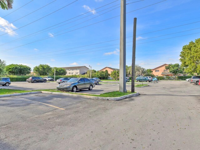 5390 W 21st Ct Unit 312, Hialeah, FL 33016 - view of asphalt street with curbs